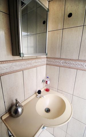 Casa à venda com 317m², 4 quartos e 3 vagasBanheiro da piscina