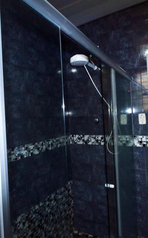 Casa à venda com 317m², 4 quartos e 3 vagasBanheiro Social