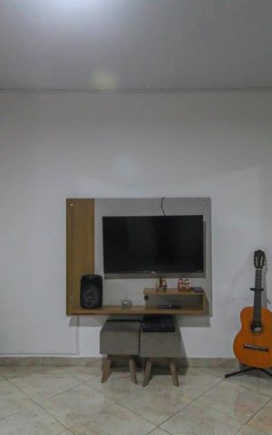 Casa à venda com 140m², 2 quartos e 2 vagas Casa à venda com 140m², 2 quartos e 2 vagasSala