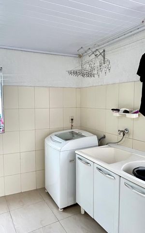 Casa à venda com 200m², 4 quartos e 3 vagas Casa à venda com 200m², 4 quartos e 3 vagasÁrea de Serviço