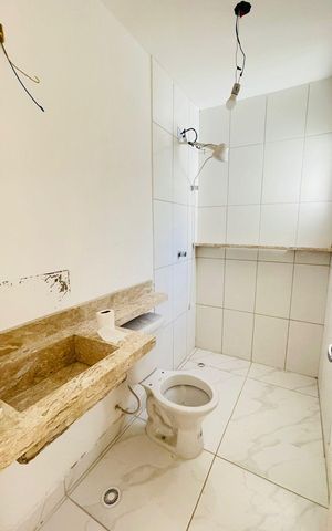 Casa de condomínio para alugar com 125m², 2 quartos e 2 vagasBanheiro da suíte 