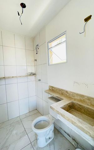 Casa de condomínio para alugar com 125m², 2 quartos e 2 vagasBanheiro da suíte 2