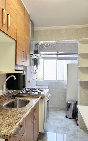 Apartamento à venda com 50m², 2 quartos e 2 vagas Apartamento à venda com 50m², 2 quartos e 2 vagasCozinha