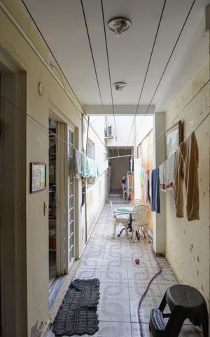 Casa à venda com 150m², 3 quartos e 2 vagas Casa à venda com 150m², 3 quartos e 2 vagasCORREDOR AREA EXTERNA