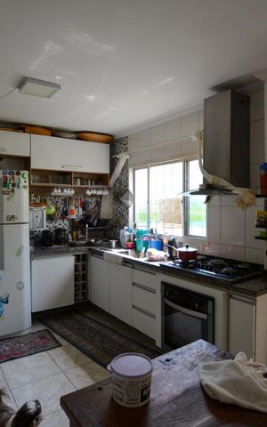 Casa à venda com 150m², 3 quartos e 2 vagas Casa à venda com 150m², 3 quartos e 2 vagasCOZINHA