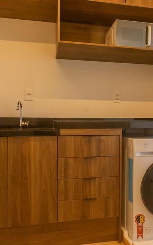 Studio para alugar com 34m², 1 quarto e sem vaga Studio para alugar com 34m², 1 quarto e sem vagaCozinha e Área de Serviço