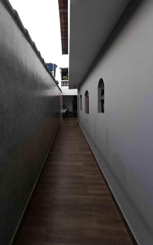 Casa à venda com 196m², 3 quartos e 2 vagas Casa à venda com 196m², 3 quartos e 2 vagasCorredor externo