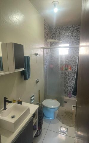 Casa à venda com 60m², 2 quartos e 1 vaga Casa à venda com 60m², 2 quartos e 1 vagaBanheiro