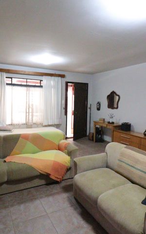 Casa à venda com 139m², 2 quartos e 2 vagasSala