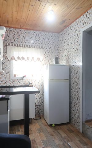 Casa à venda com 90m², 3 quartos e sem vagaSala/Cozinha