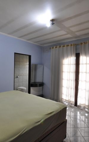 Casa à venda com 320m², 4 quartos e 2 vagasQuarto Suíte