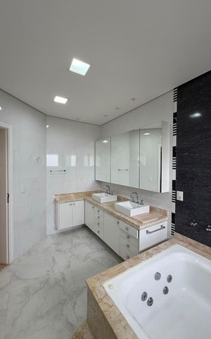 Casa de condomínio à venda com 424m², 4 quartos e 3 vagas