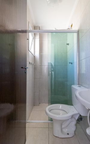Casa à venda com 105m², 2 quartos e 2 vagas Casa à venda com 105m², 2 quartos e 2 vagasBanheiro da Suíte 2