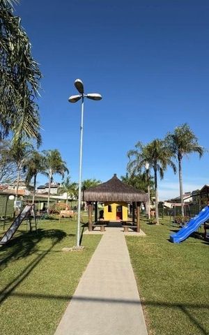 Casa de condomínio à venda com 312m², 5 quartos e 4 vagas Casa de condomínio à venda com 312m², 5 quartos e 4 vagasÁrea externa