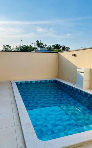 Casa de condomínio à venda com 312m², 5 quartos e 4 vagas Casa de condomínio à venda com 312m², 5 quartos e 4 vagasÁrea externa
