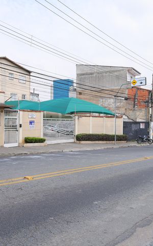 Casa de condomínio para alugar com 70m², 2 quartos e 1 vagaFachada - Placa GRANDE instalada na fachada do condomínio, dia 26.08.2026 - Código da placa: GOAV-125 