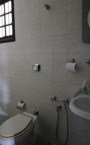 Casa de condomínio para alugar com 371m², 4 quartos e 4 vagas Banheiro 2