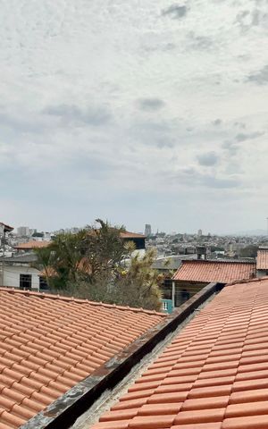 Casa à venda com 100m², 3 quartos e 2 vagas Casa à venda com 100m², 3 quartos e 2 vagasVista da janela
