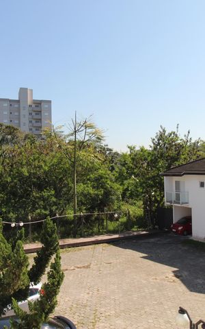 Casa de condomínio para alugar com 84m², 2 quartos e 2 vagasSuíte