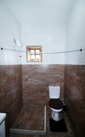 Casa à venda com 217m², 4 quartos e 4 vagasBanheiro Social