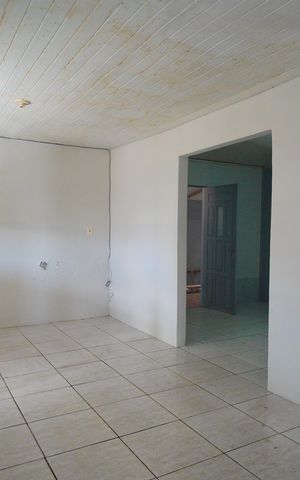 Casa à venda com 100m², 2 quartos e 2 vagasSala/Cozinha