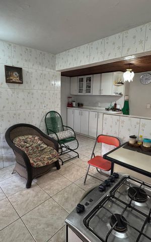 Casa à venda com 125m², 4 quartos e 2 vagas Casa à venda com 125m², 4 quartos e 2 vagasCozinha