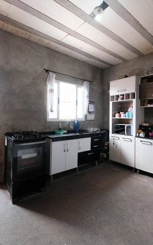 Casa à venda com 206m², 3 quartos e 2 vagasCozinha e Área de Serviço