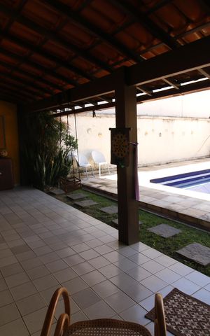 Casa de condomínio à venda com 675m², 6 quartos e 4 vagasVaranda do quintal 