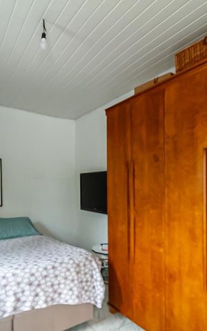 Casa à venda com 80m², 2 quartos e 2 vagas Casa à venda com 80m², 2 quartos e 2 vagasSuíte