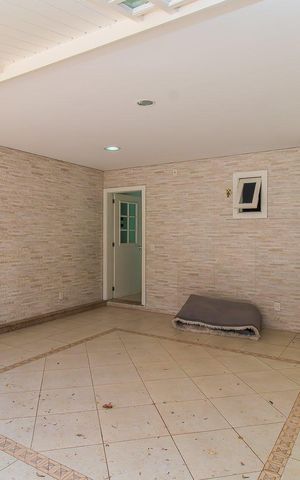 Casa de condomínio à venda com 208m², 4 quartos e 3 vagasGaragem