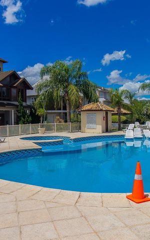 Casa de condomínio à venda com 208m², 4 quartos e 3 vagasÁrea externa