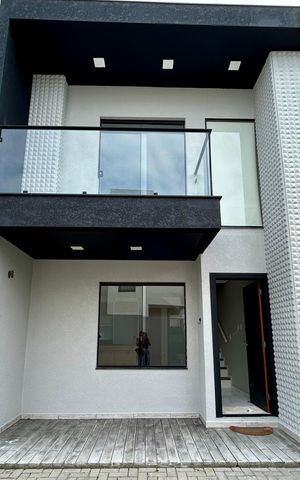 Casa de condomínio para alugar com 70m², 3 quartos e 1 vaga Casa de condomínio para alugar com 70m², 3 quartos e 1 vagaFachada