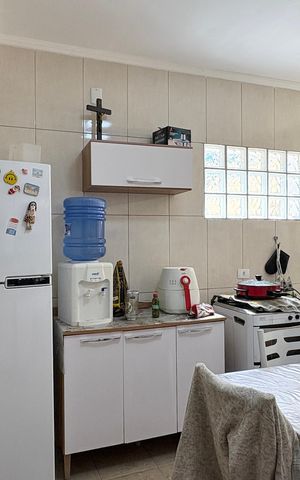 Casa à venda com 50m², 2 quartos e 1 vaga Casa à venda com 50m², 2 quartos e 1 vagaCozinha
