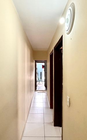 Casa à venda com 130m², 5 quartos e 2 vagas Casa à venda com 130m², 5 quartos e 2 vagasCorredor