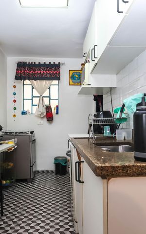 Apartamento à venda com 54m², 2 quartos e 1 vagaCozinha e Área de Serviço
