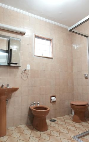Casa à venda com 296m², 3 quartos e 4 vagasBanheiro da Suíte