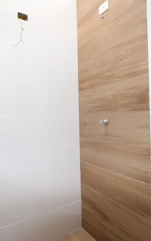 Casa à venda com 73m², 2 quartos e 1 vaga Casa à venda com 73m², 2 quartos e 1 vagaBanheiro da Suíte 2