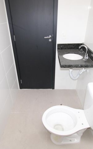 Casa à venda com 73m², 2 quartos e 1 vaga Casa à venda com 73m², 2 quartos e 1 vagaBanheiro da Suíte 1