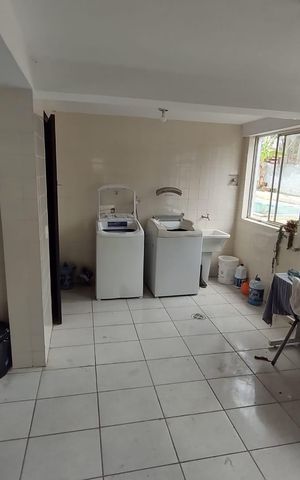 Casa de condomínio para alugar com 400m², 3 quartos e 4 vagas Casa de condomínio para alugar com 400m², 3 quartos e 4 vagasLavanderia