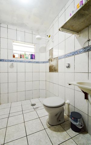Casa à venda com 125m², 3 quartos e 2 vagasBanheiro