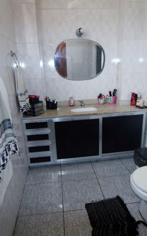 Casa à venda com 240m², 4 quartos e 3 vagasBanheiro 3 - 2º piso