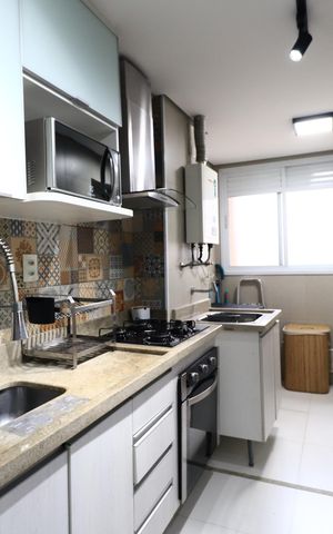 Apartamento à venda com 70m², 2 quartos e 1 vagaCozinha e Área de Serviço