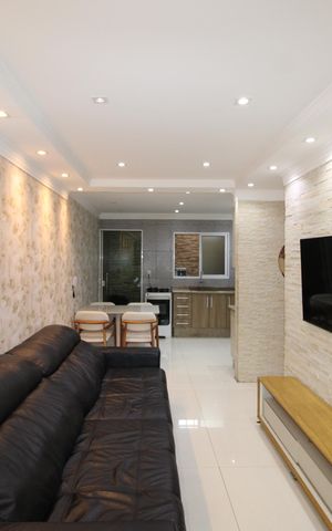 Casa à venda com 90m², 2 quartos e 2 vagasSala/Cozinha