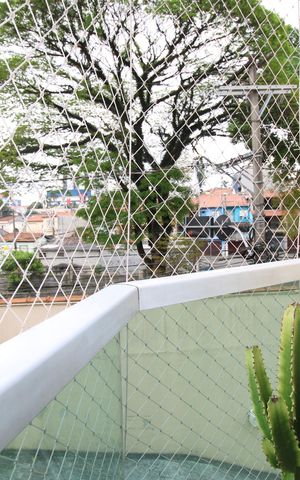 Casa à venda com 90m², 2 quartos e 2 vagasVaranda da sala