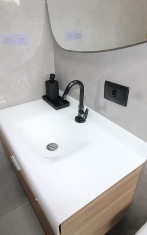 Casa à venda com 90m², 2 quartos e 2 vagasBanheiro da Suíte 1