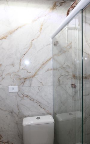 Casa à venda com 90m², 2 quartos e 2 vagasBanheiro da Suíte 2