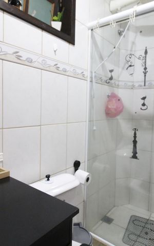 Casa de condomínio à venda com 85m², 2 quartos e 1 vagaBanheiro da Suíte 1