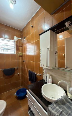 Casa à venda com 140m², 3 quartos e 2 vagasBanheiro Casa 1
