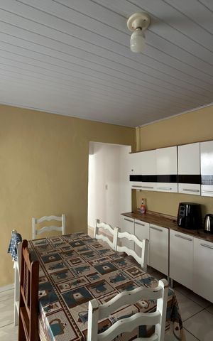 Casa à venda com 140m², 3 quartos e 2 vagasCozinha  Casa 1