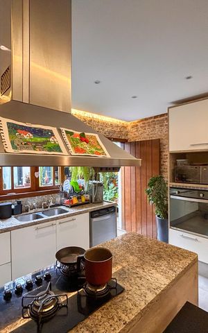 Casa à venda com 110m², 2 quartos e 2 vagas Casa à venda com 110m², 2 quartos e 2 vagasCozinha americana
